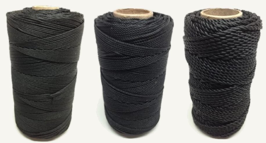 Three reels of black tarred polyester twine